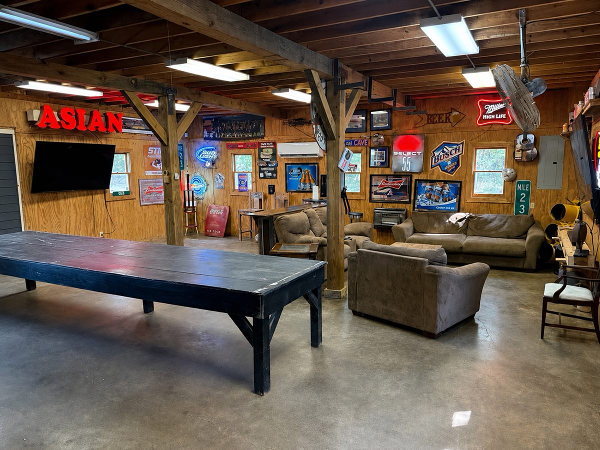 A mancave for bachelor parties and retreats with a bar area.